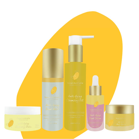 Skincare set including Anti-Aging Cleansing Balm, Anti-Aging Cleansing Oil, Anti-Aging Dual Mist, Anti-Aging Dual Serum, Anti-Aging 24k Gold Cream 